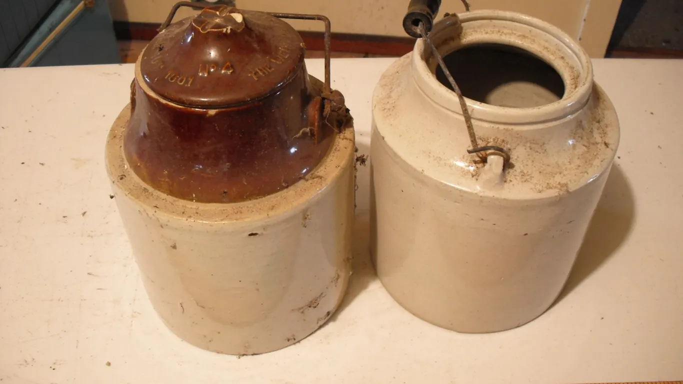 2 pickle crocks - 1 with bad cracks