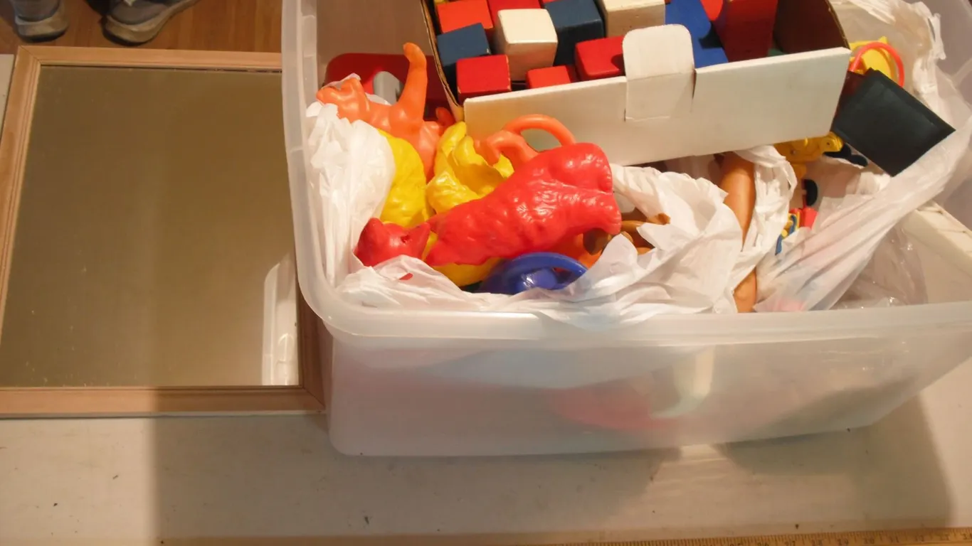 assorted toys and mirror