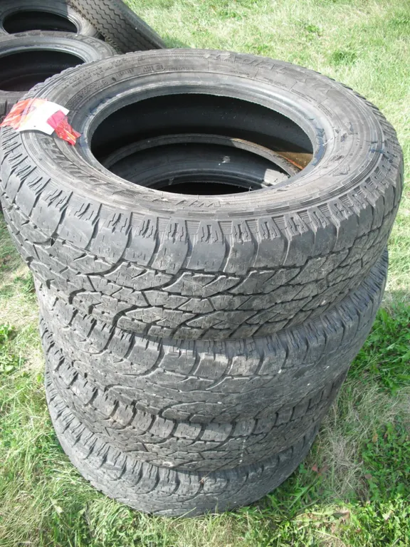 set of 4 tires - Wild Country T225/75R16