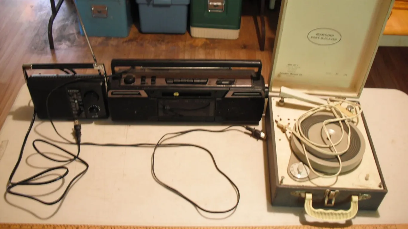 2 radios and port-o-player record player