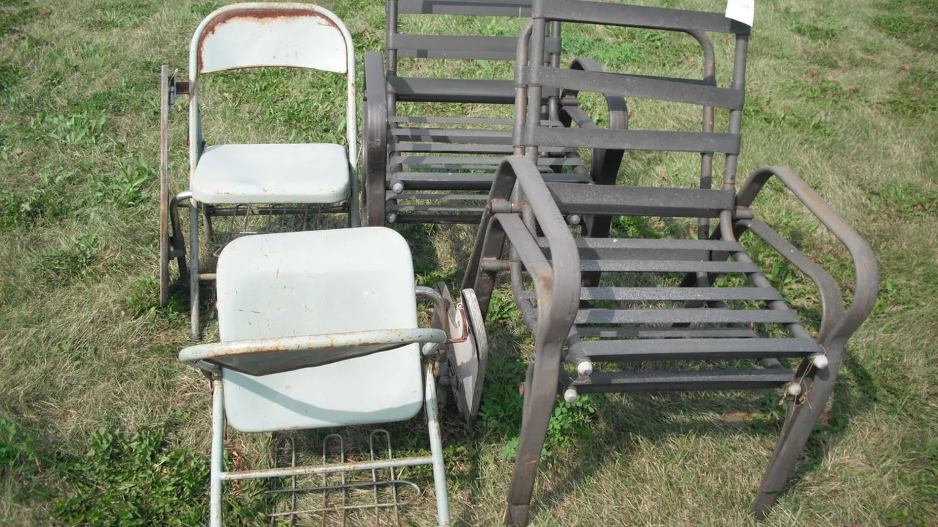 lot of folding chairs and patio chairs