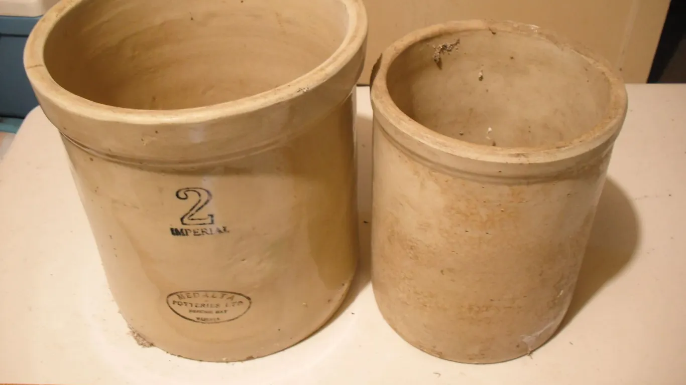 2x vintage crocks - 1 is a 2 gallon Medalta