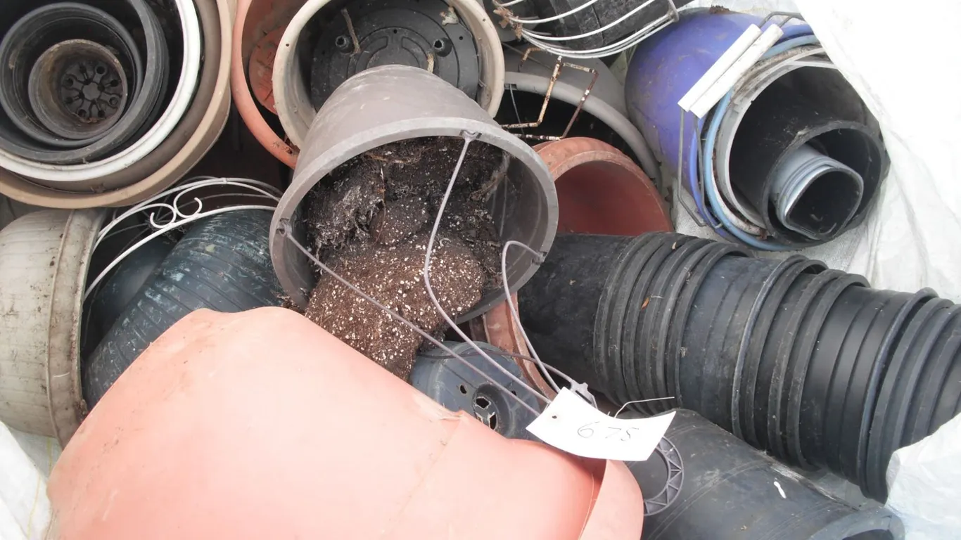 large lot of plant pots in grain bag