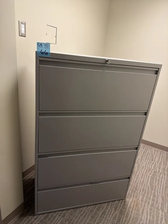 Filing Cabinet, 54” tall x 36” wide x 18” deep, located behind front reception area