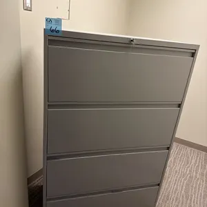 Filing Cabinet, 54” tall x 36” wide x 18” deep, located behind front reception area