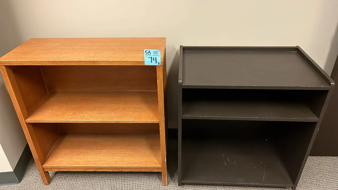 2 Bookcases, light brown 32”x14”x34.5”, dark brown with wheels 29”x18”x31.5”