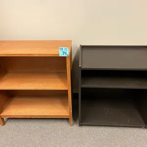 2 bookshelves, light brown 32”x14”x34.5”, dark brown with wheels 29”x18”x31.5”
