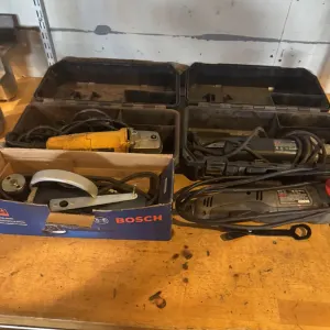 (4) Electric Grinders (two with Tool Container) and an Electric Sawzall