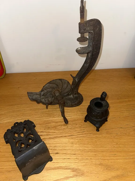 Antique cherry pitter, etc.