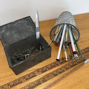 Vintage knitting needles, yardsticks, etc.