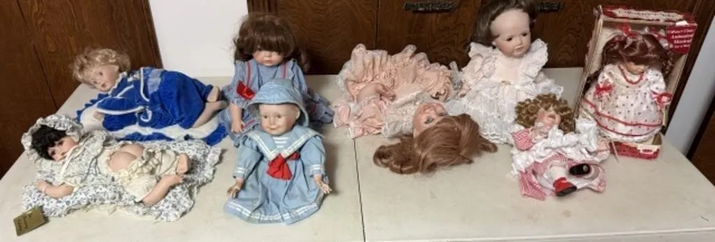 8+/- Porcelain Collectible Dolls