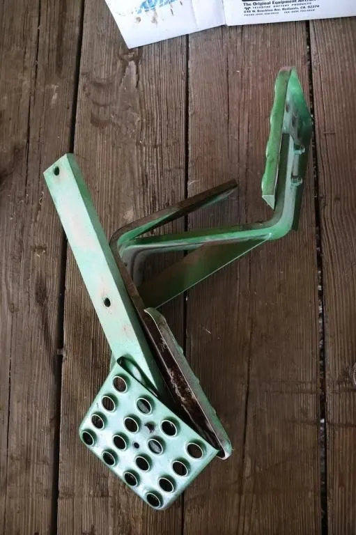 Three John Deere cab steps