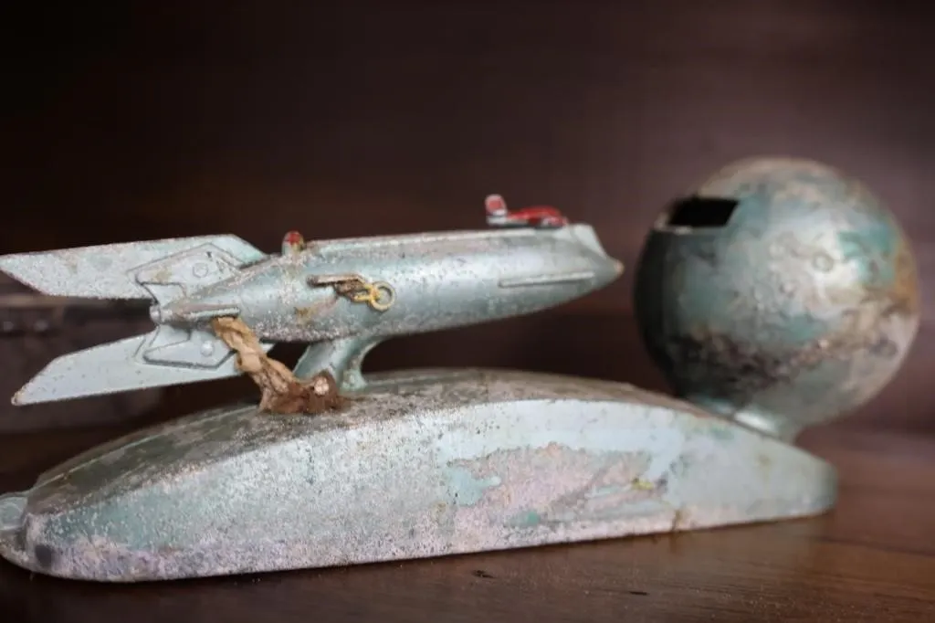 Rocket ship piggy bank (pot metal)