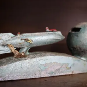 Rocket ship piggy bank (pot metal)