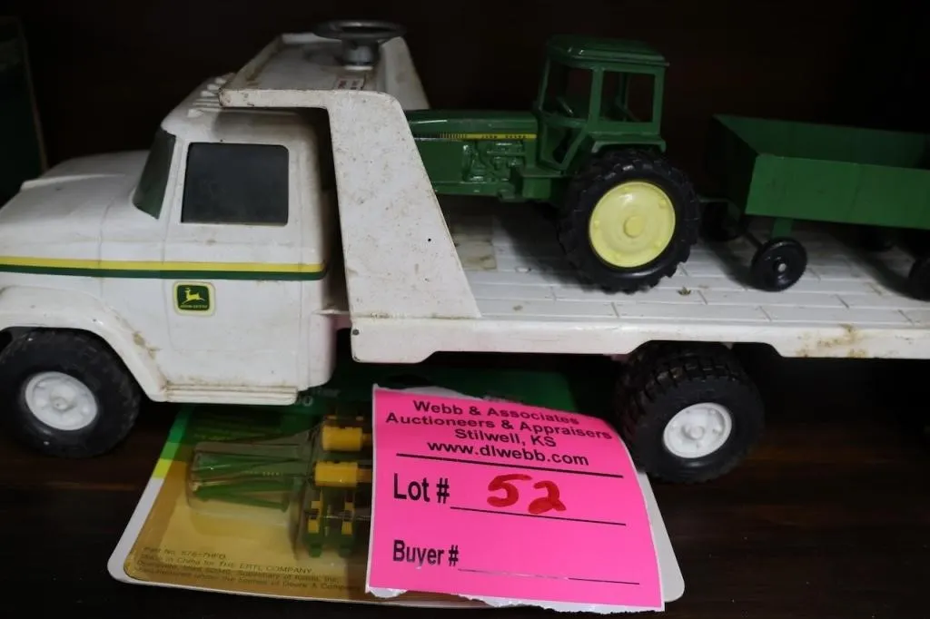 John Deere flatbed equipment truck with