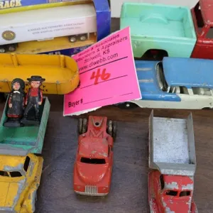 Assortment of 7 miniature JD toys