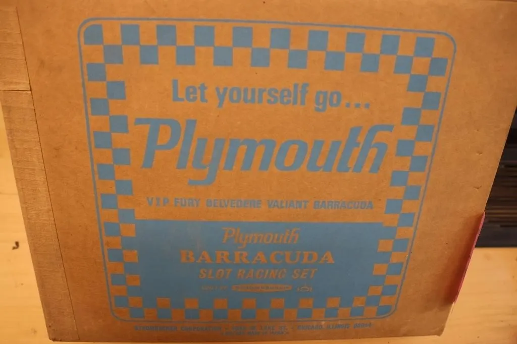 Plymouth Barracuda slot racing set with track and
