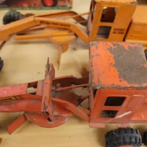 2 metal toy road graders