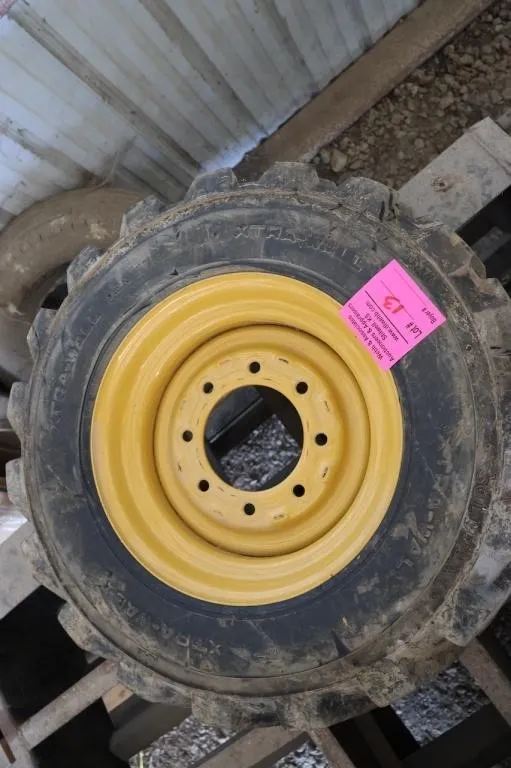 13 New Caterpillar skid steer wheel