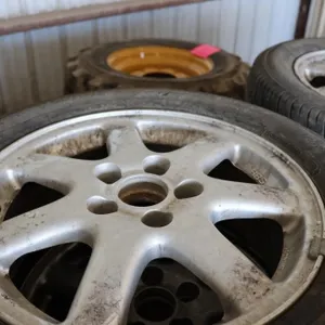 Four 16� aluminum wheels with tires