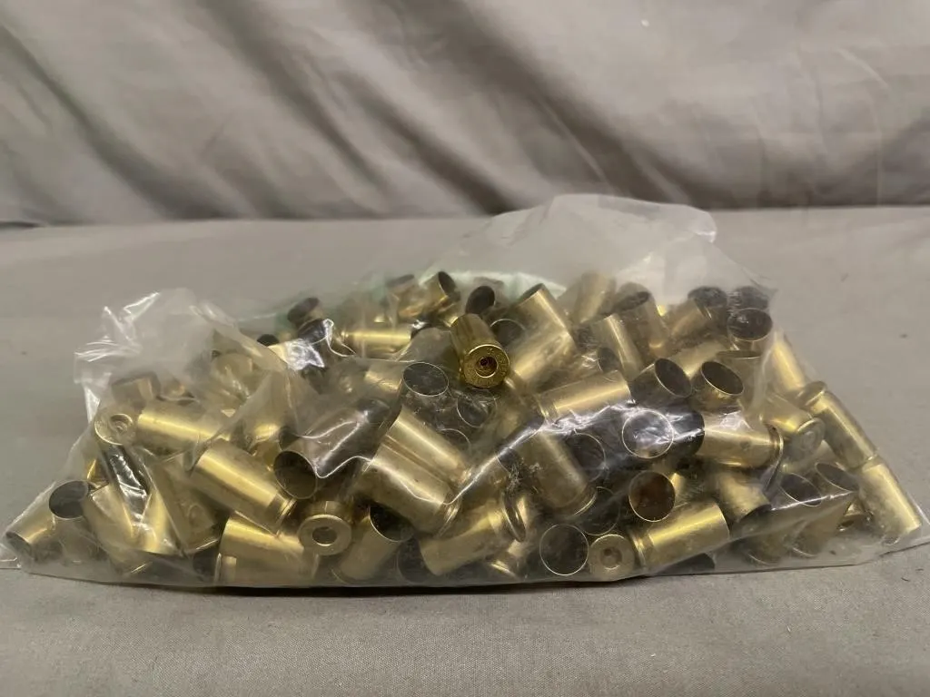 Bag of 215 .45 Winchester ACP brass cartridges.