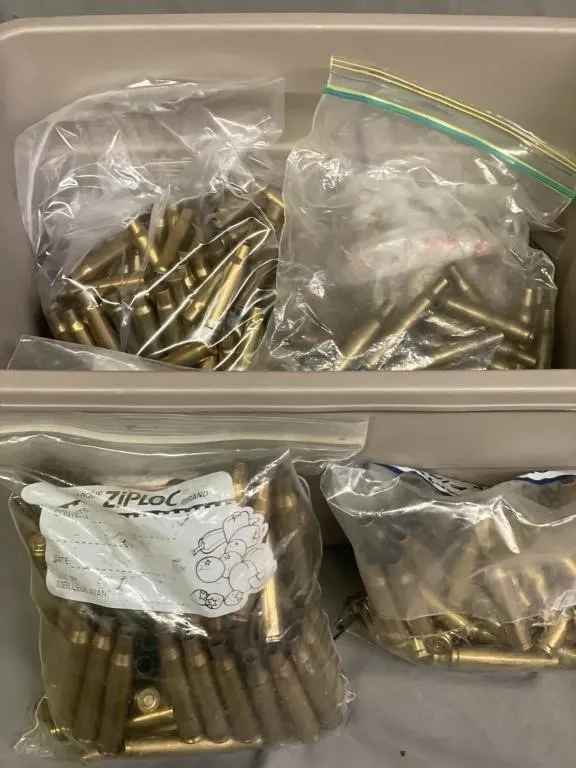 Tote with approx 5.4kg of .208 cal. brass
