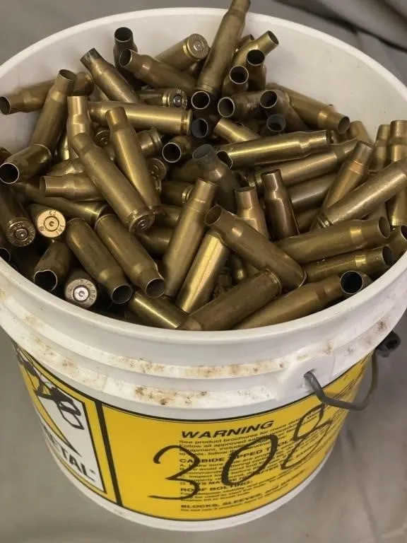 Pail of approx. 5.3kg of .308 cal. brass.