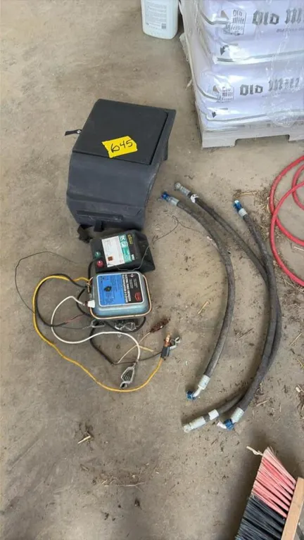 2- electric fencers, 3- hydraulic hose, 1- container