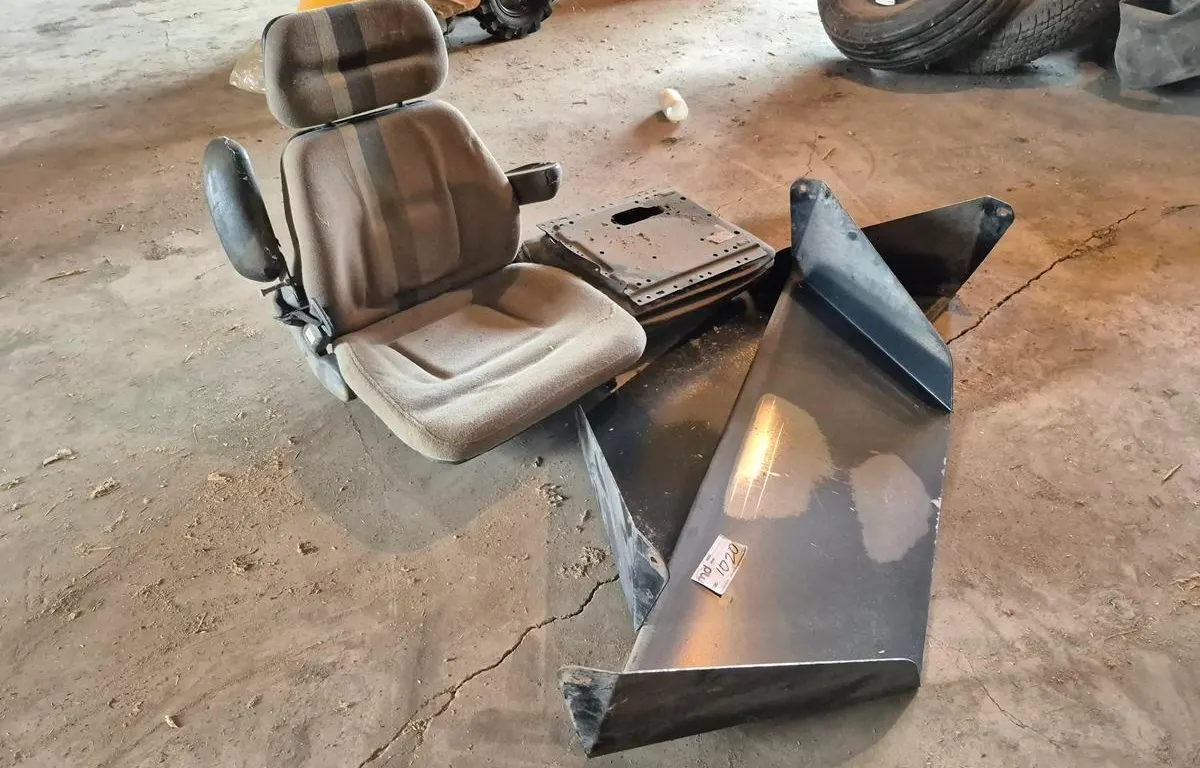 Tractor Operator Seat and Combine Discharge Plate
UNRESERVED