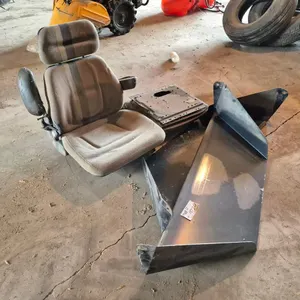 Tractor Operator Seat and Combine Discharge Plate
 UNRESERVED