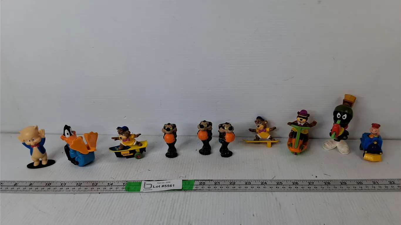 (10) Cartoon Figurines- Charlie Brown, Porky Pig, Daffy Duck, Misc.