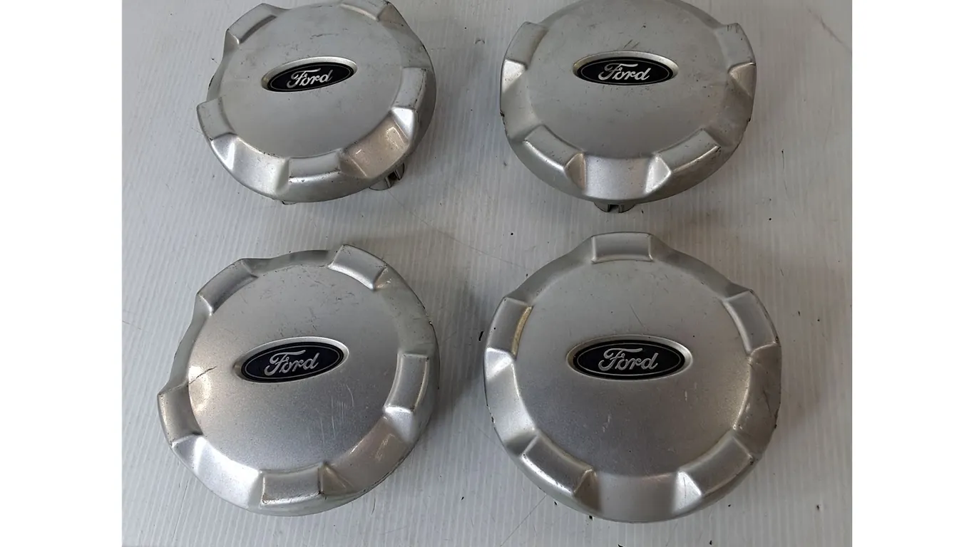 (4) Plastic Ford Escape Hubcaps