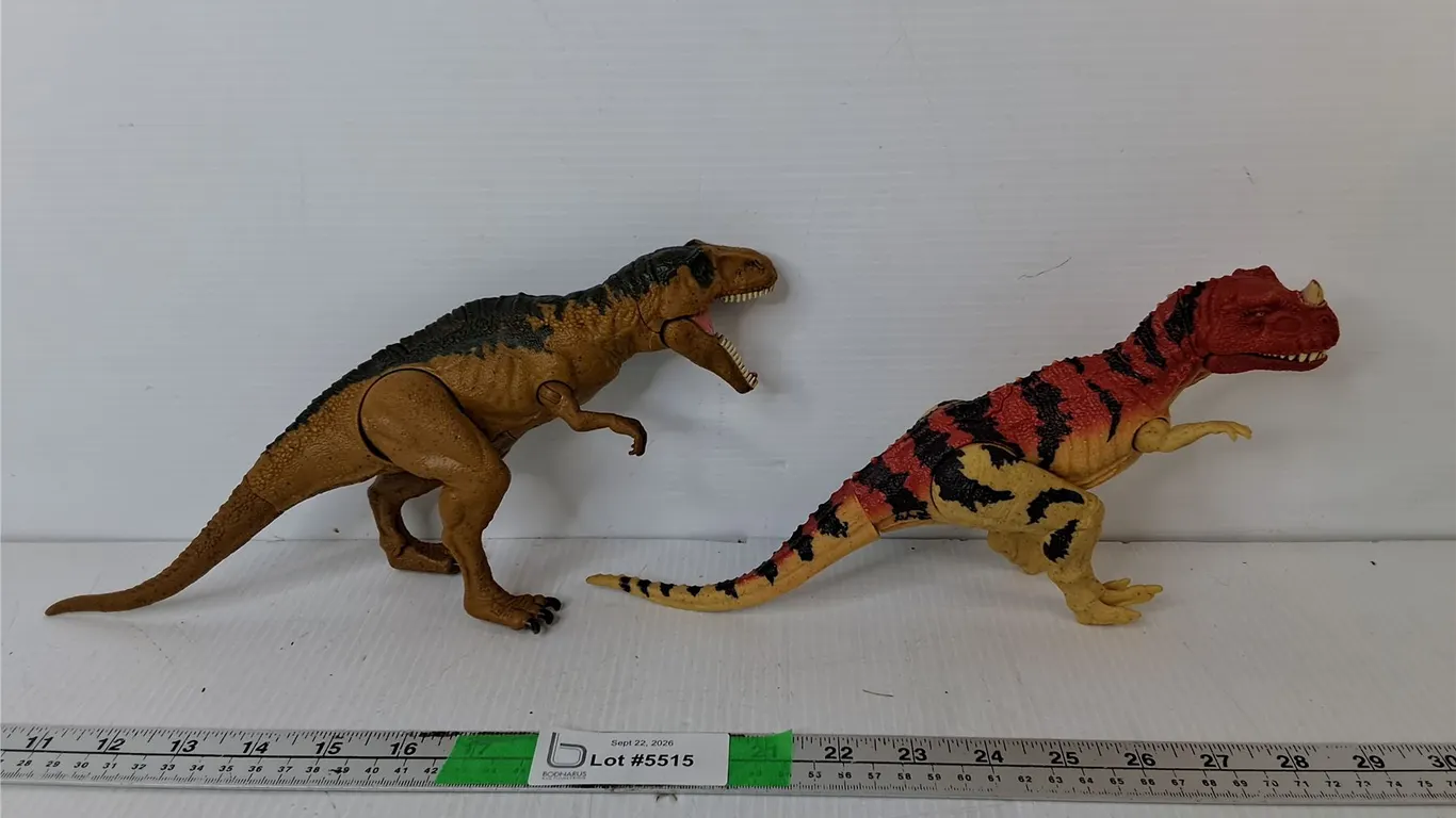 (2) Raptor Style Toy Dinosaurs- As Is