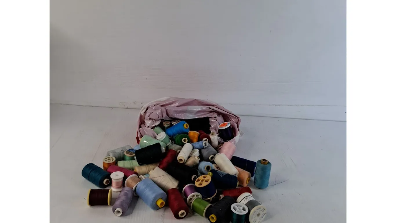 Assorted Sewing Thread Spools And Cones