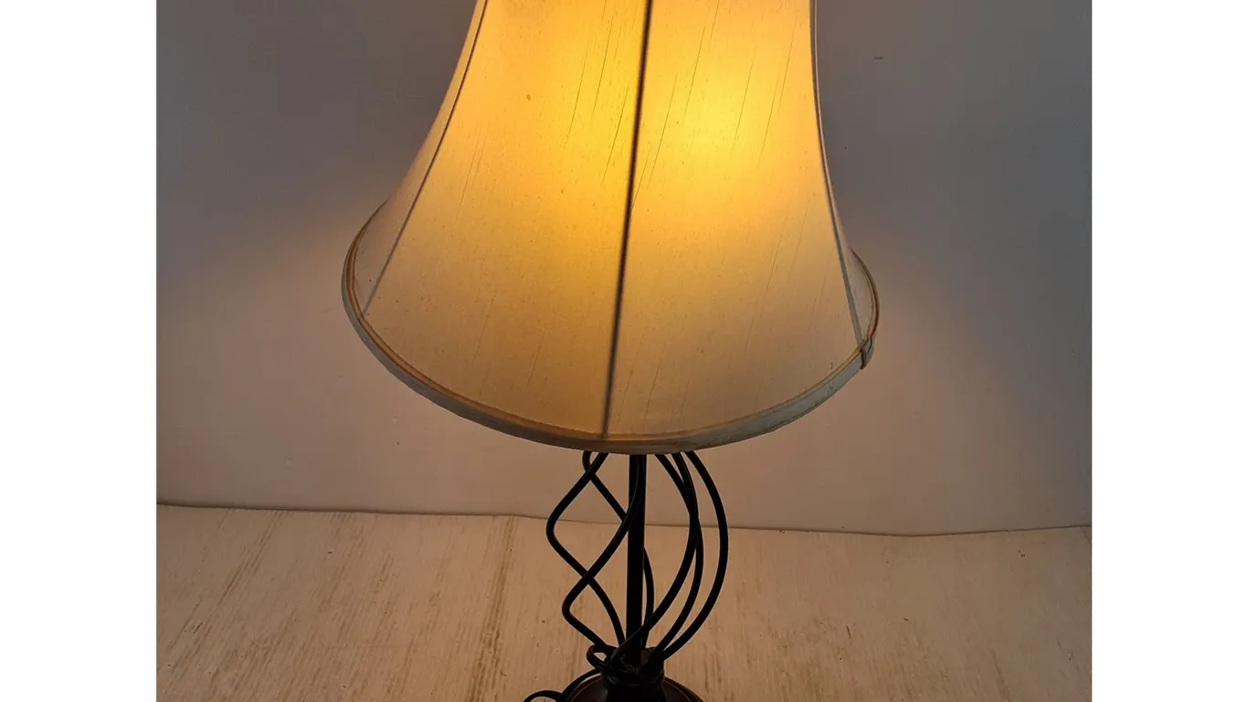Table Lamp with Black Wrought Iron Base Powers On