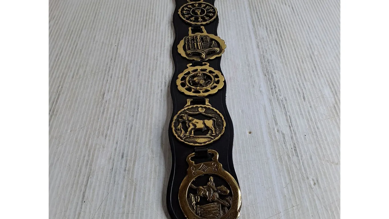 (1) Leather Strap with 6 Horse Medallions