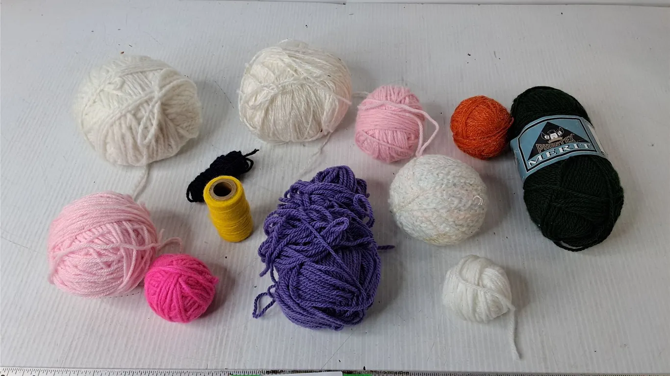 Rolls of Yarn & Spool of Thread