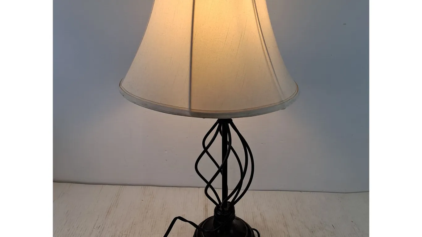 Table Lamp with Black Wrought Iron Base Powers On