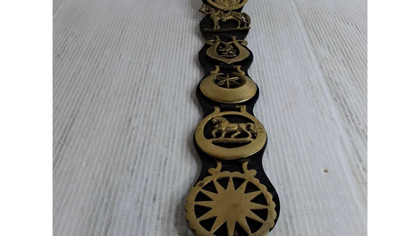 (1) Leather Strap with 6 Horse Medallions