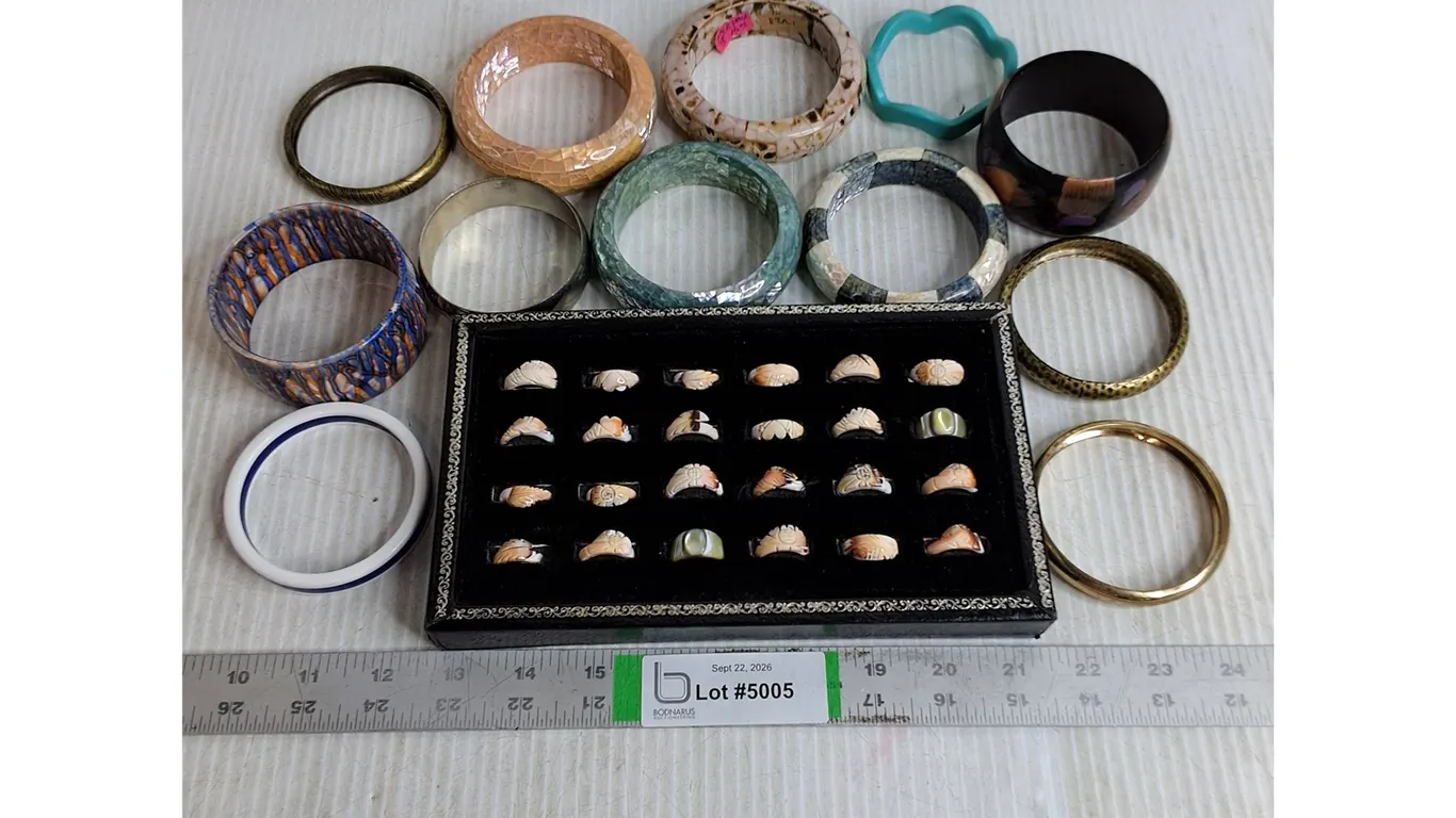 (24) Hand-Carved Shell Rings in Tray-Assorted Sizes-(12) Assorted Bangles