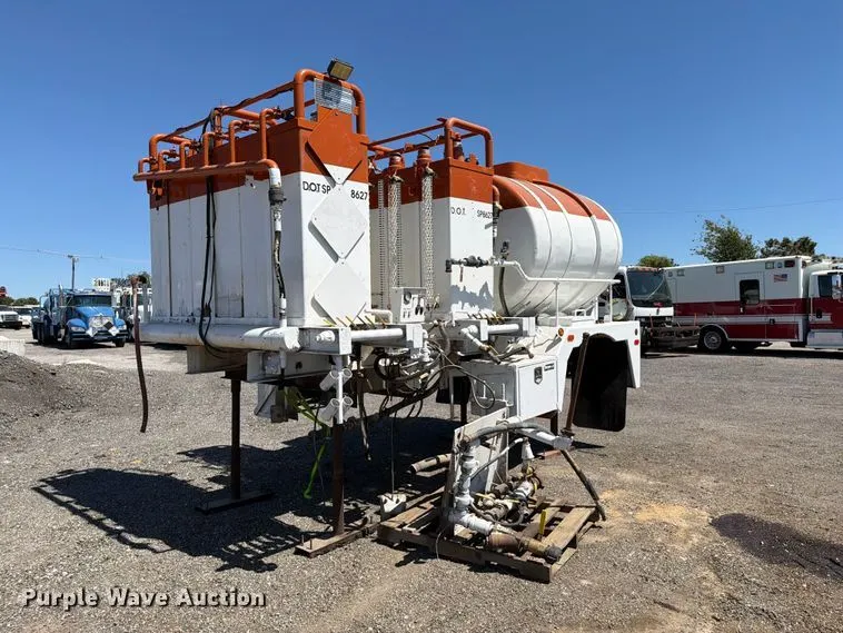 Oil acidizer tank bed