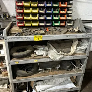 Assorted Wheel Weights, Tools, And Rack