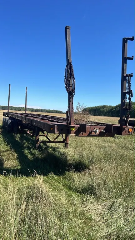OFFSITE - 1980’s Manac 42’ log trailer