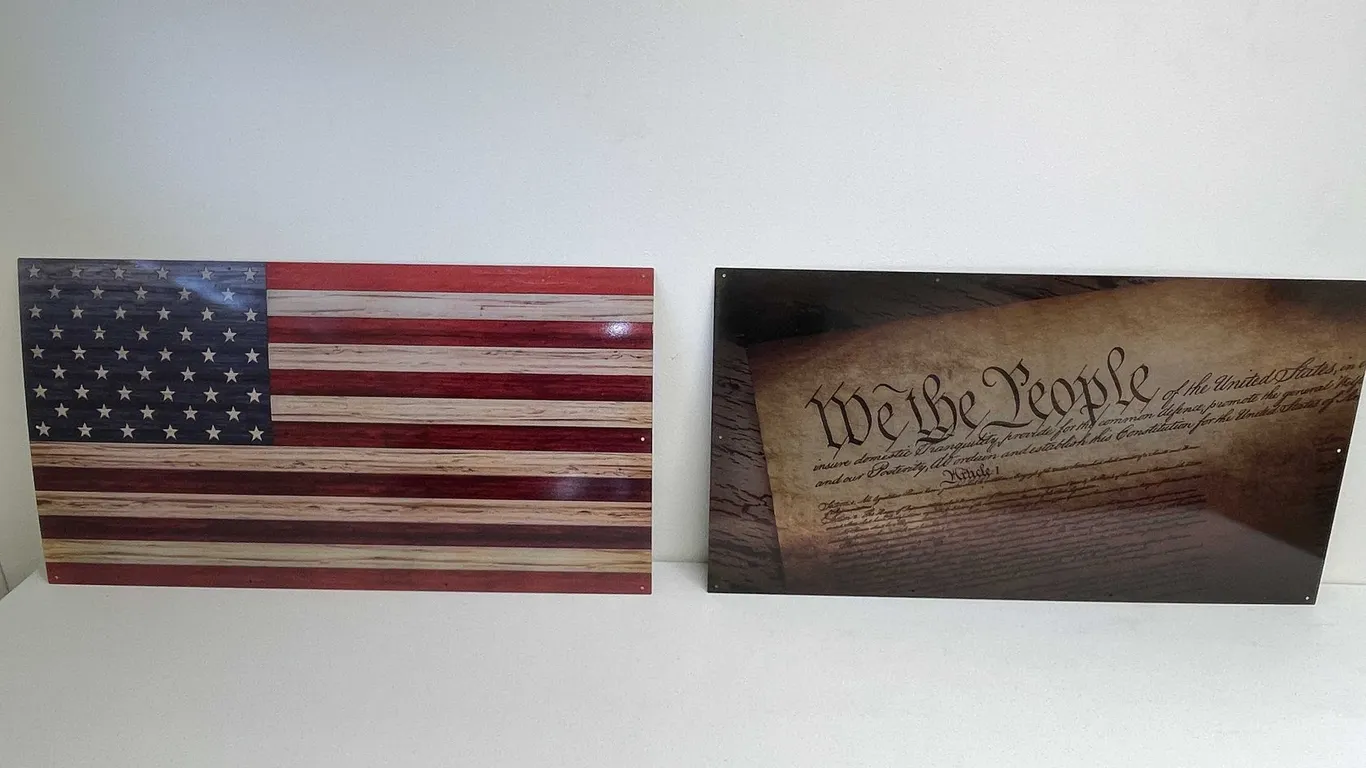 American Flag and We The People Sign