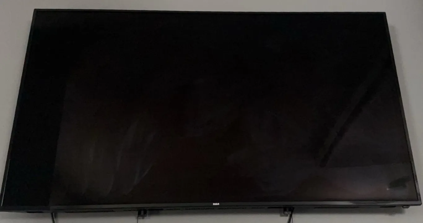 RCA Flat Screen Television with Two RCA Remotes