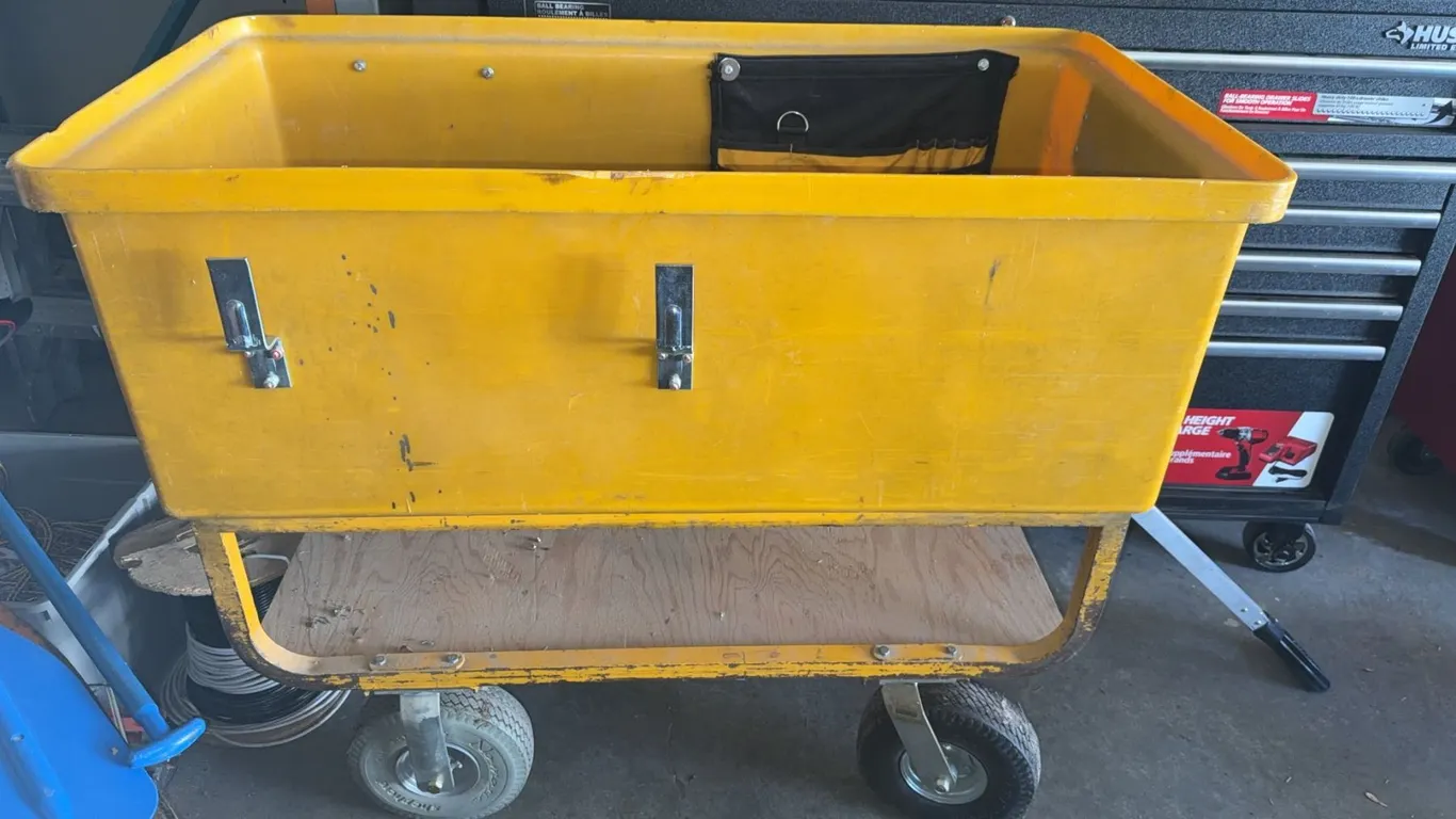 Yellow Utility Cart with Rubber Wheels and Mounted Power Strip