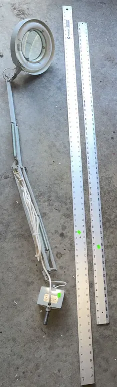 Articulating Magnifying Lamp with Two Metal Meter Sticks