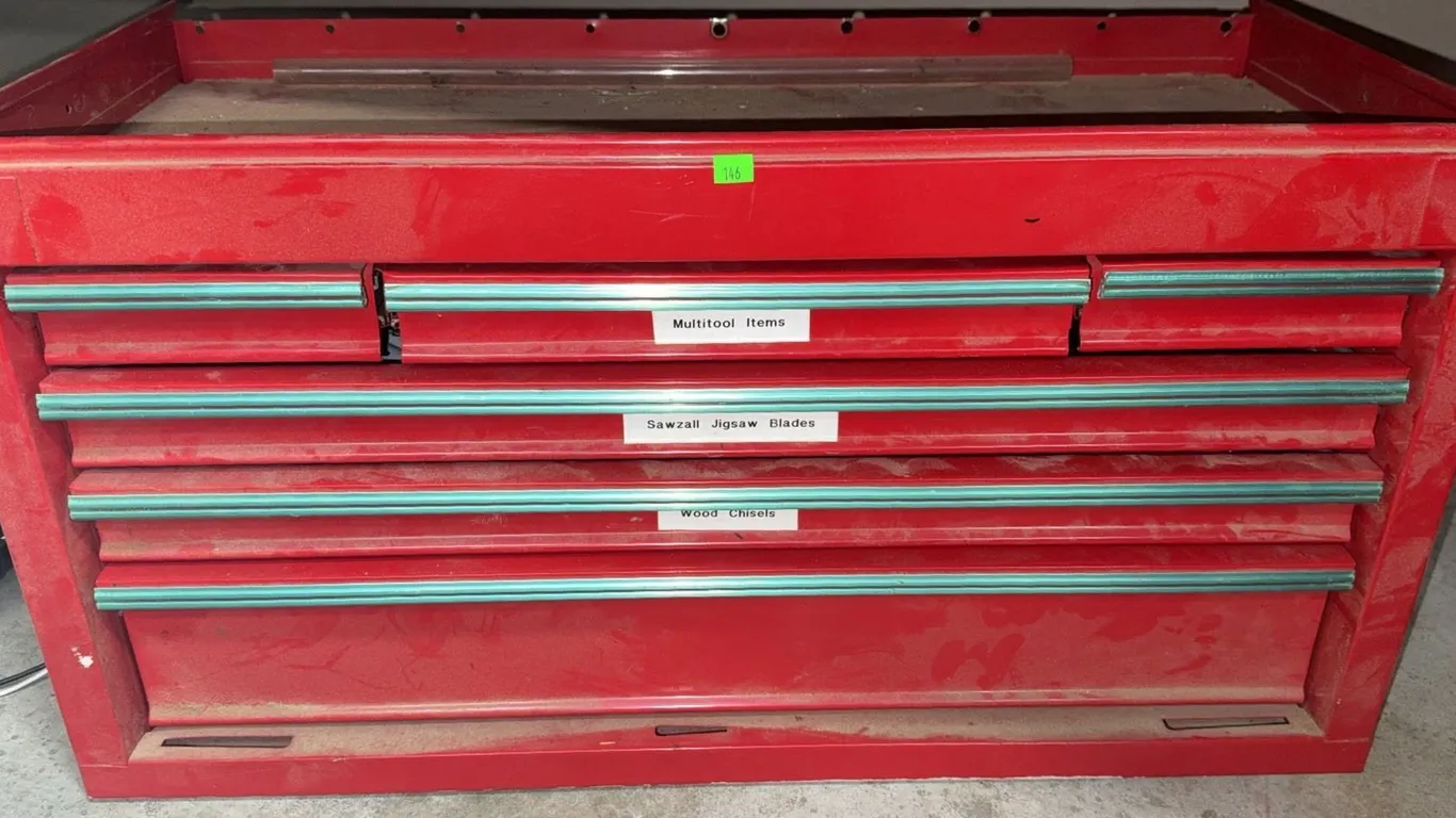 Red Metal Tool Chest with Assorted Hand Tools and Accessories