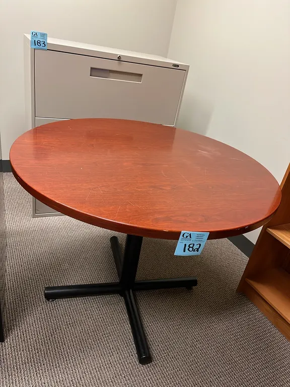 Round Table, single pedestal, 39” diameter, 29” height, dark cherry finish