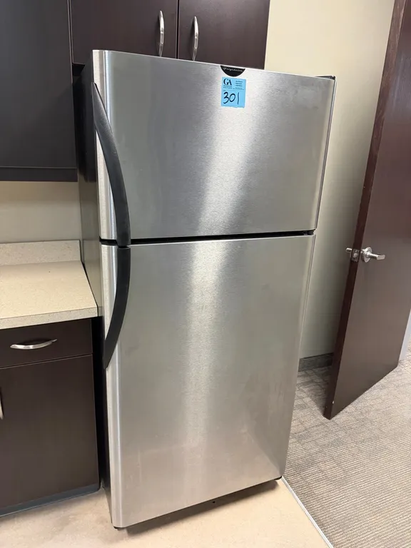 Frigidaire Stainless Steel Top-Freezer Refrigerator, Model FRT8S6ESBC, sides and top are black